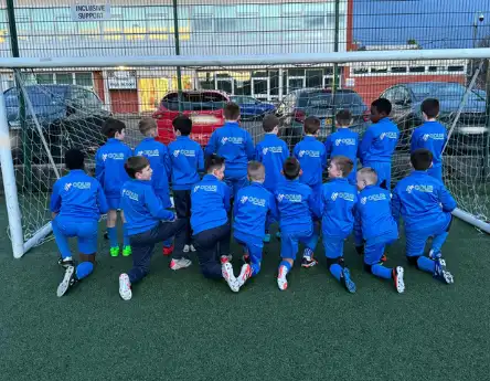 Renfrew juniors FC boys team in Opus Blue Zipper tops 